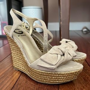 Cute summery mauve Guess wedges with a gold woven heel